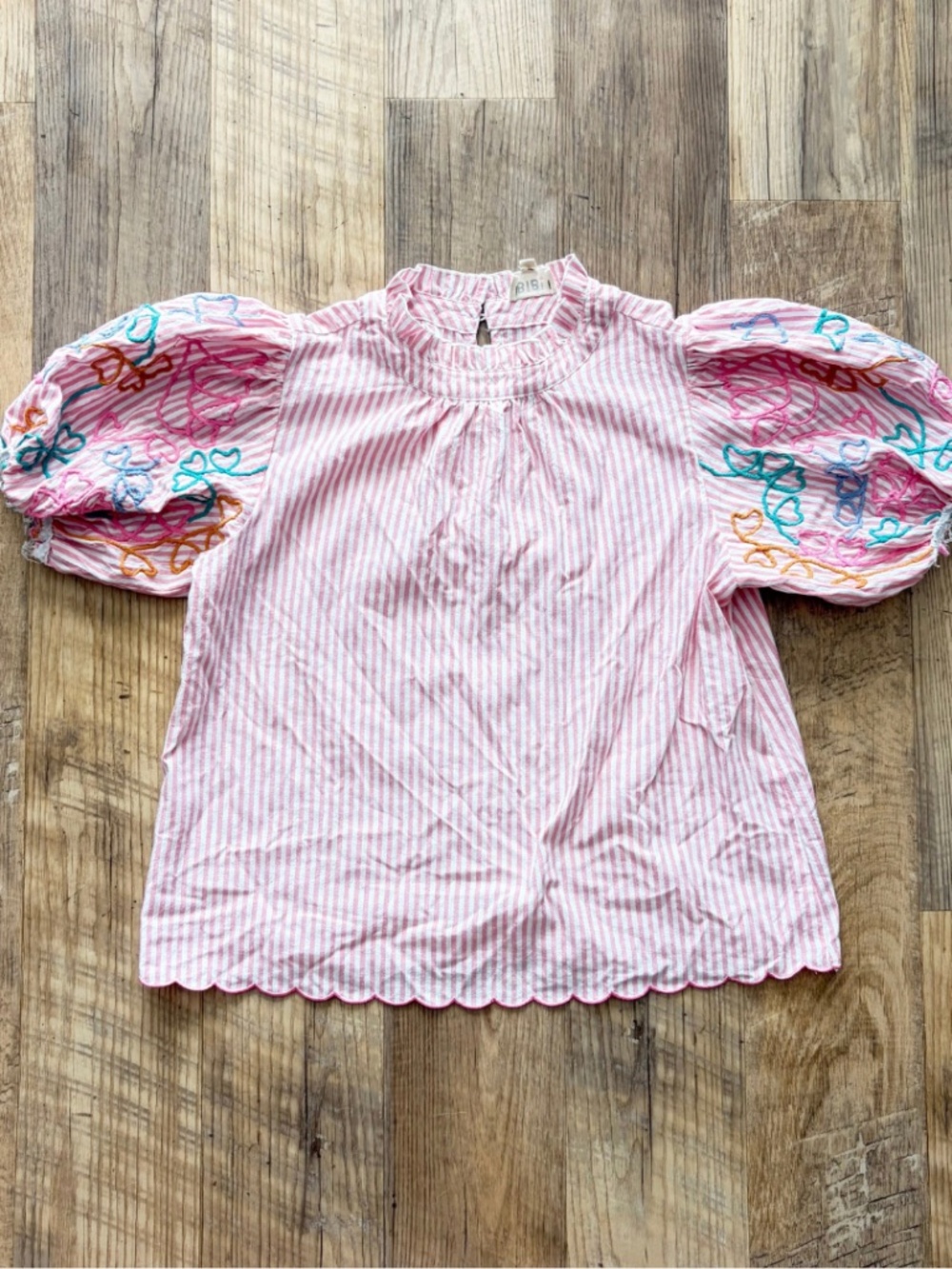 BiBi Pink Blouse with Ruffled Neckline and Puff Sleeves